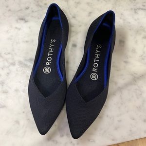 Rothy’s navy point toe flats
